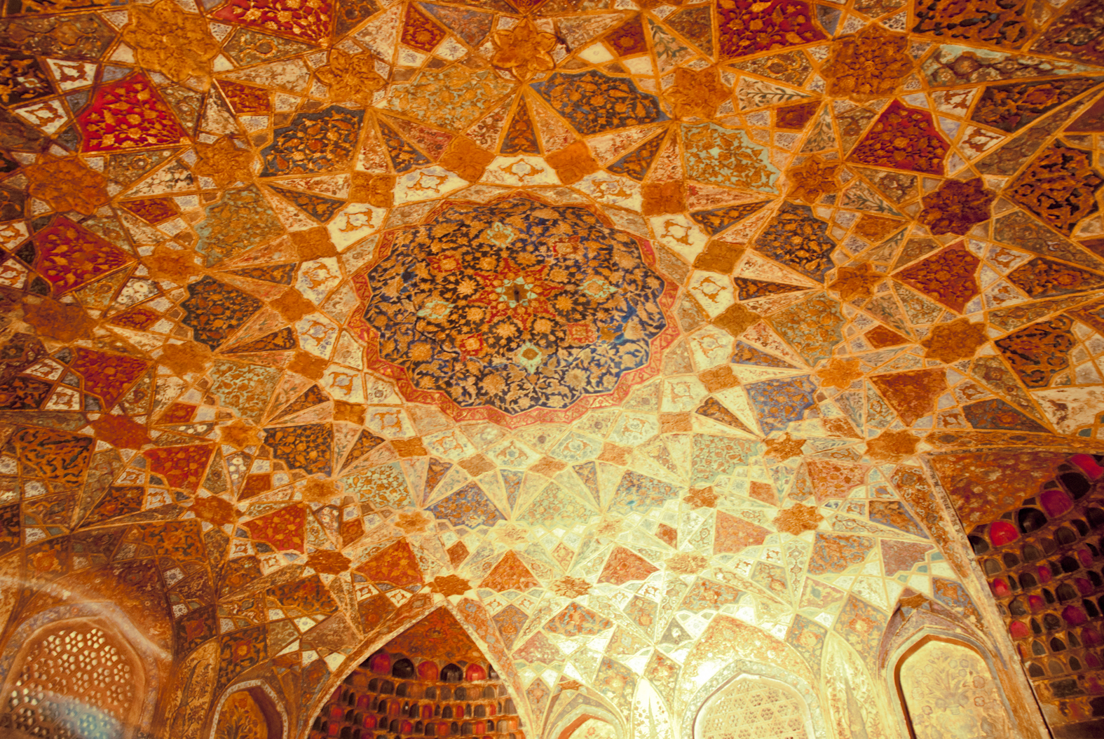 Geometric and floral patterns on a ceiling